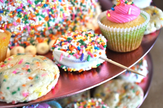 I baked confetti-cake cookies, mini cupcakes, and dipped oreos in white chocolate and coated them with sprinkles.